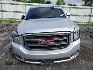 2015 GMC Yukon SLT with VIN 1GKS2BKC9FR518381, listed as a Copart auction lot 66352864 with 103,419 mi miles and Salvage Title. Bid and sale history available at carsss.com. Image 5.