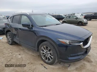 2021 Mazda CX-5 Signature with VIN JM3KFBEY9M0343758, listed as a Copart auction lot 46469785 with 41,757 mi miles and Salvage Title. Bid and sale history available at carsss.com. Image 4.