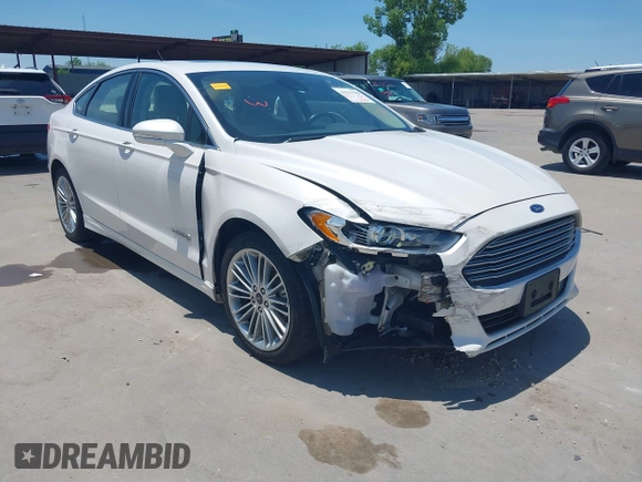 2014 Ford Fusion SE Hybrid with VIN 3FA6P0LUXER233658, listed as a IAAI auction lot 42311588 with 106,282 mi miles and . Bid and sale history available at DreamBid. Image 1.