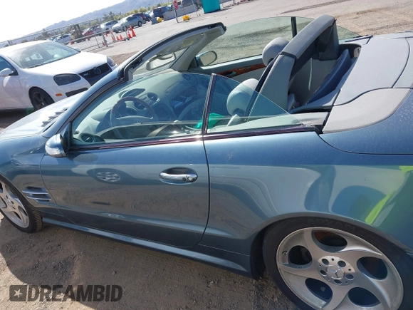 2005 Mercedes-Benz SL 500 with VIN WDBSK75F95F106944, listed as a IAAI auction lot 41970698 with 123,881 mi miles and . Bid and sale history available at DreamBid. Image 14.