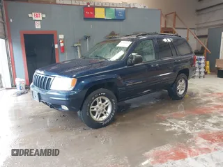 2000 Jeep Grand Cherokee Limited with VIN 1J4GW58N1YC264567, listed as a IAAI auction lot 42215459 with 170,874 mi miles and . Bid and sale history available at DreamBid. Image 2.