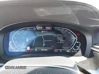 2022 BMW 5 Series 530e xDrive with VIN WBA33AG01NCJ52906, listed as a IAAI auction lot 42686511 with 45,710 mi miles and . Bid and sale history available at DreamBid. Image 7.