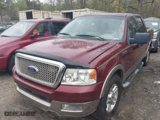 2004 Ford F-150 XLT with VIN 1FTPW12564KD77115, listed as a IAAI auction lot 41929386 with 213,172 mi miles. Bid and sale history available at carsss.com. Image 2.
