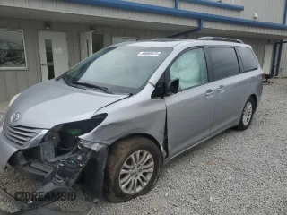 2015 Toyota Sienna XLE с VIN 5TDYK3DC6FS656017, выставлен на аукционе Copart как лот 58695975 с пробегом Не указан миль и Списание • Salvage title. История ставок и продаж доступна на DreamBid. Изображение 1.