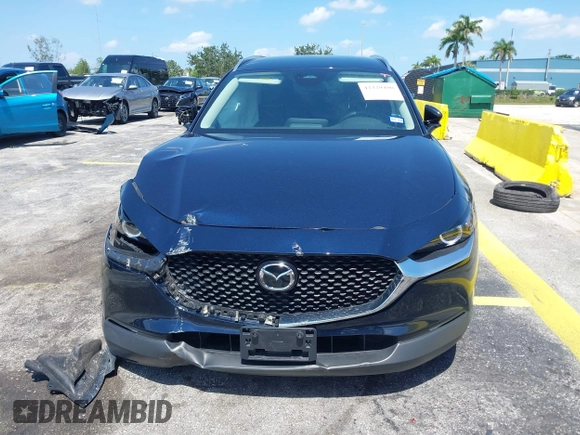 2024 Mazda CX-30 S Select Sport z VIN 3MVDMBBM0RM697731, wystawiony jako IAAI lot #42329490 z przebiegiem 17 675 mil mil oraz . Historia ofert i sprzedaży dostępna na DreamBid. Obrazek 12.