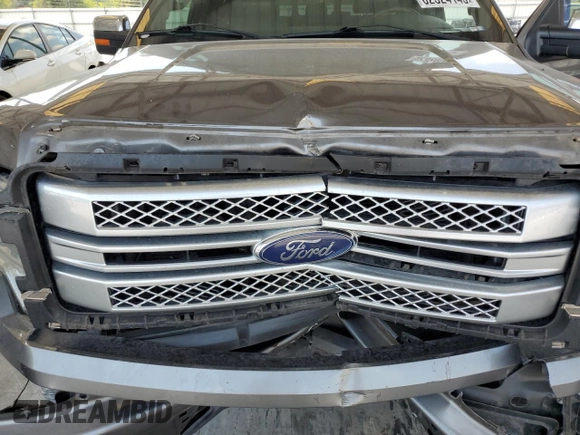 2014 Ford F-150 XL with VIN 1FTFW1EF1EFC83847, listed as a Copart auction lot 62324145 with 211,763 mi miles and Salvage title. Bid and sale history available at DreamBid. Image 11.