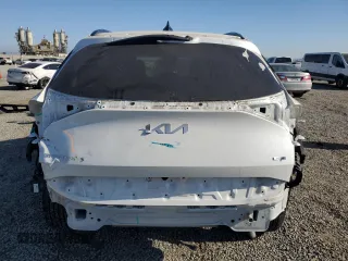 2023 Kia Sportage SX-Prestige with VIN KNDPXCAG8P7019761, listed as a Copart auction lot 63272395 with 22,547 mi miles and Salvage title. Bid and sale history available at DreamBid. Image 6.