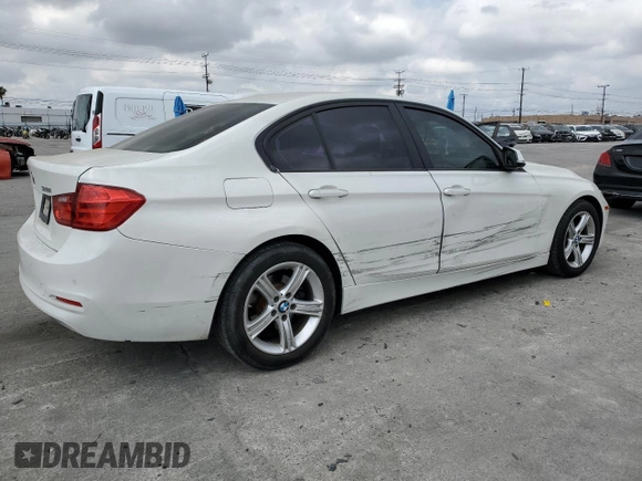 2015 BMW 3 Series 328i with VIN WBA3C1C55FK120405, listed as a Copart auction lot 54374035 with 121,411 mi miles and Salvage title. Bid and sale history available at DreamBid. Image 3.