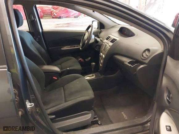 2010 Toyota Yaris with VIN JTDBT4K33A1354492, listed as a IAAI auction lot 40736581 with 228,018 mi miles. Bid and sale history available at carsss.com. Image 5.