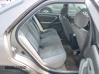 1998 Toyota Camry LE z VIN 4T1BG22K2WU278958, wystawiony jako IAAI lot #42422136 z przebiegiem 272 772 mil mil oraz . Historia ofert i sprzedaży dostępna na DreamBid. Obrazek 8.