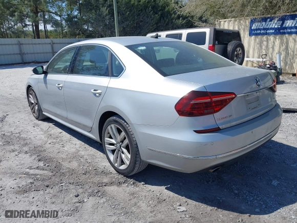 2017 Volkswagen Passat 1.8T SE w/Technology with VIN 1VWGT7A3XHC025096, listed as a IAAI auction lot 41891297 with 124,375 mi miles. Bid and sale history available at carsss.com. Image 3.