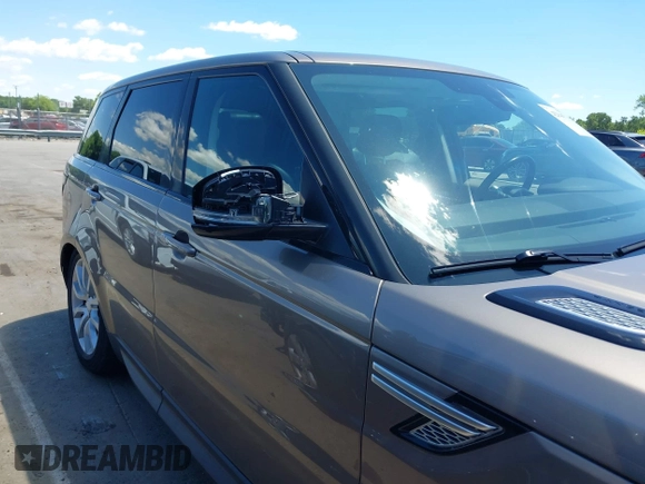 2015 Land Rover Range Rover Sport HSE z VIN SALWR2VF1FA531194, wystawiony jako IAAI lot #42344714 z przebiegiem 130 981 mil mil oraz . Historia ofert i sprzedaży dostępna na DreamBid. Obrazek 13.
