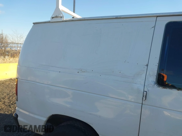 2004 Ford Econoline Cargo with VIN 1FTSE34L84HA87783, listed as a IAAI auction lot 41222516 with 245,991 mi miles and . Bid and sale history available at carsss.com. Image 13.