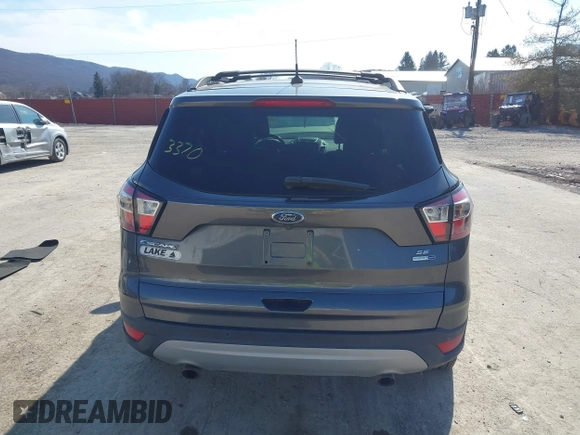 2017 Ford Escape SE with VIN 1FMCU9G99HUD03370, listed as a IAAI auction lot 41700809 with 136,575 mi miles. Bid and sale history available at carsss.com. Image 17.