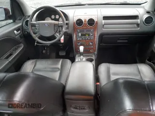 2005 Ford Freestyle Limited with VIN 1FMDK06165GA06262, listed as a Copart auction lot 52496885 with 161,759 mi miles and Salvage Title. Bid and sale history available at carsss.com. Image 8.