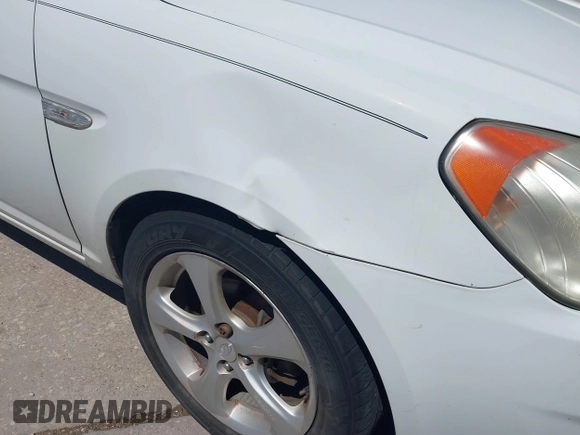 2007 Hyundai Accent SE with VIN KMHCN36C47U009459, listed as a IAAI auction lot 41979395 with 202,844 mi miles. Bid and sale history available at carsss.com. Image 6.