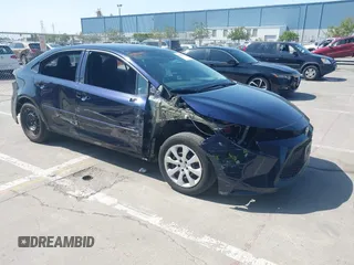 2020 Toyota Corolla LE with VIN 5YFEPRAE5LP145142, listed as a IAAI auction lot 42153289 with 35,010 mi miles and . Bid and sale history available at DreamBid. Image 1.