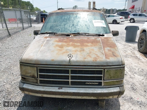 1987 Dodge Caravan z VIN 2B4FK41G3HR127301, wystawiony jako IAAI lot #42393563 z przebiegiem Nie podano mil oraz . Historia ofert i sprzedaży dostępna na DreamBid. Obrazek 10.
