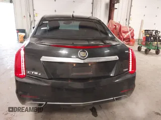 2014 Cadillac CTS Luxury AWD with VIN 1G6AX5S36E0173682, listed as a IAAI auction lot 41538709 with 102,772 mi miles and . Bid and sale history available at DreamBid. Image 17.