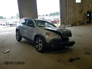 2014 Jeep Cherokee Trailhawk with VIN 1C4PJMBSXEW213981, listed as a Copart auction lot 60440495 with 136,612 mi miles and Salvage title. Bid and sale history available at DreamBid. Image 15.
