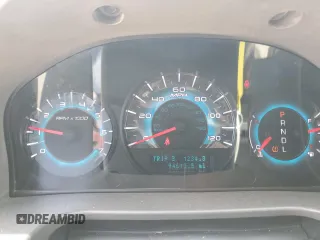 2012 Ford Fusion SE z VIN 3FAHP0HA0CR328833, wystawiony jako Copart lot #57631955 z przebiegiem 94 613 mil mil oraz Szkoda całkowita • Salvage title. Historia ofert i sprzedaży dostępna na DreamBid. Obrazek 9.