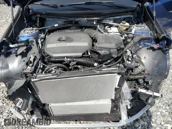 2023 BMW X1 xDrive28i with VIN WBX73EF05P5Y21721, listed as a Copart auction lot 50749295 with 10,633 mi miles and Salvage title. Bid and sale history available at DreamBid. Image 12.