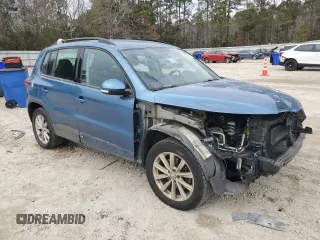 2017 Volkswagen Tiguan S with VIN WVGBV7AX2HK046312, listed as a Copart auction lot 42393295 with 94,814 mi miles and Salvage Title. Bid and sale history available at DreamBid. Image 4.