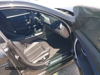 2019 BMW 4 Series 430i with VIN WBA4J1C59KBM17309, listed as a IAAI auction lot 42011443 with 87,189 mi miles. Bid and sale history available at carsss.com. Image 5.