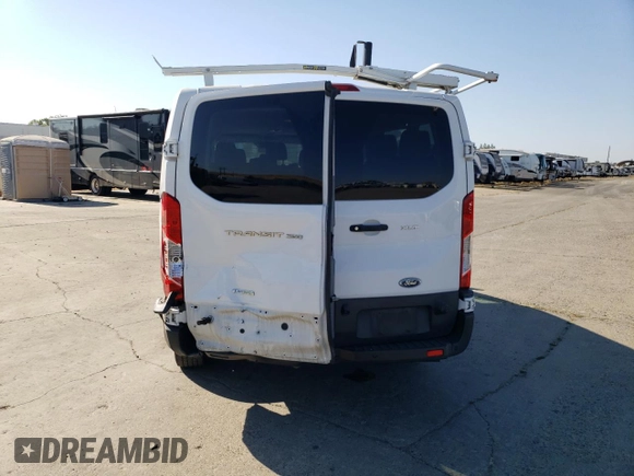 2018 Ford Transit Passenger XL with VIN 1FBZX2YG9JKA72955, listed as a Copart auction lot 59350194 with 151,401 mi miles and Salvage title. Bid and sale history available at DreamBid. Image 6.