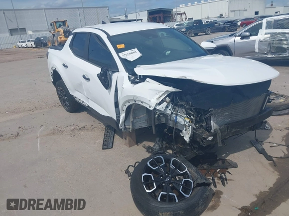 2022 Hyundai Santa Cruz SEL z VIN 5NTJBDAE5NH007005, wystawiony jako IAAI lot #42058065 z przebiegiem 30 825 mil mil oraz . Historia ofert i sprzedaży dostępna na DreamBid. Obrazek 1.