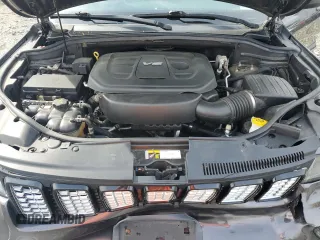 2017 Jeep Grand Cherokee Altitude z VIN 1C4RJFAG9HC720250, wystawiony jako Copart lot #56956155 z przebiegiem 138 879 mil mil oraz Szkoda całkowita • Salvage title. Historia ofert i sprzedaży dostępna na DreamBid. Obrazek 12.