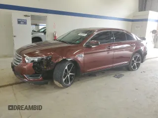 2015 Ford Taurus SEL with VIN 1FAHP2E89FG172557, listed as a Copart auction lot 58838935 with 103,867 mi miles and Salvage title. Bid and sale history available at DreamBid. Image 1.