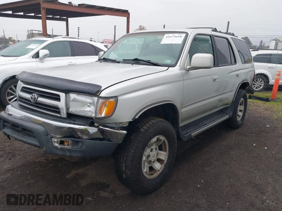1999 Toyota 4Runner SR5 with VIN JT3HN86RXX0232435, listed as a IAAI auction lot 41473618 with 267,054 mi miles and . Bid and sale history available at DreamBid. Image 18.