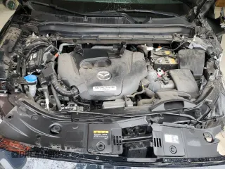 2023 Mazda CX-5 Signature with VIN JM3KFBXY6P0235017, listed as a Copart auction lot 45979615 with 14,487 mi miles and Salvage Title. Bid and sale history available at carsss.com. Image 14.
