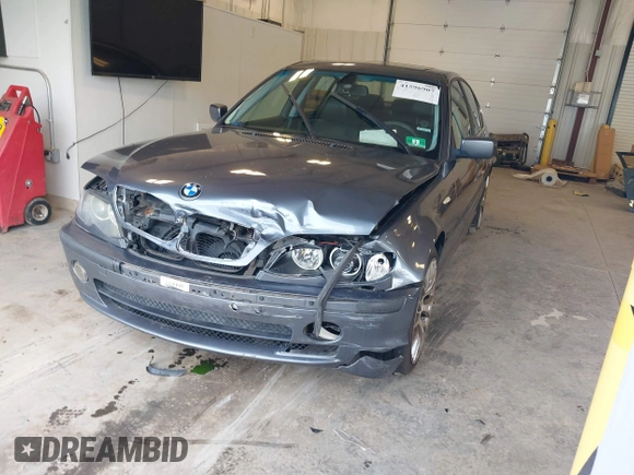 2003 BMW 3 Series 330xi with VIN WBAEW53463PG22999, listed as a IAAI auction lot 41596907 with 160,812 mi miles. Bid and sale history available at carsss.com. Image 2.