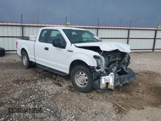 2015 Ford F-150 XL with VIN 1FTEX1CFXFKD91856, listed as a IAAI auction lot 41804968 with 224,033 mi miles. Bid and sale history available at carsss.com. Image 1.