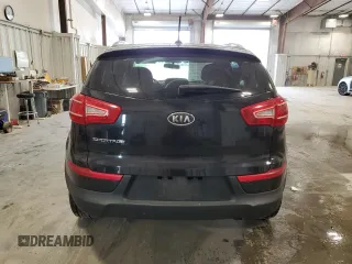 2012 Kia Sportage LX z VIN KNDPB3A24C7179584, wystawiony jako Copart lot #60938465 z przebiegiem 161 362 mil mil oraz Czysty tytuł • Clean title. Historia ofert i sprzedaży dostępna na DreamBid. Obrazek 6.