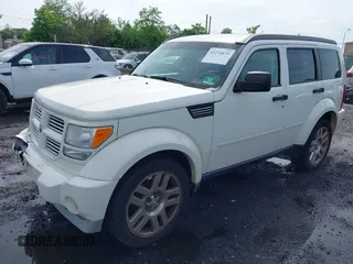 2010 Dodge Nitro Heat with VIN 1D4PU4GKXAW175021, listed as a IAAI auction lot 42274875 with 158,279 mi miles and . Bid and sale history available at DreamBid. Image 2.