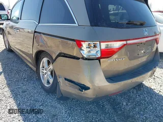 2012 Honda Odyssey Touring with VIN 5FNRL5H9XCB110672, listed as a IAAI auction lot 41826895 with 159,927 mi miles. Bid and sale history available at carsss.com. Image 6.
