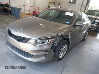 2018 Kia Optima S with VIN 5XXGT4L35JG209561, listed as a IAAI auction lot 42526577 with 161,906 mi miles and . Bid and sale history available at DreamBid. Image 2.
