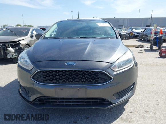 2018 Ford Focus SE with VIN 1FADP3F2XJL302358, listed as a IAAI auction lot 41807622 with 76,145 mi miles. Bid and sale history available at carsss.com. Image 12.