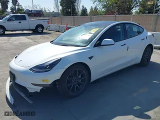 2022 Tesla Model 3 Long Range with VIN 5YJ3E1EB3NF179304, listed as a IAAI auction lot 42003380 with 46,759 mi miles. Bid and sale history available at carsss.com. Image 2.