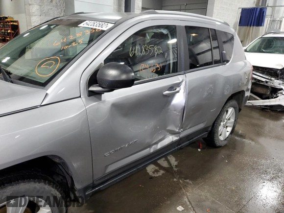 2016 Jeep Compass Sport with VIN 1C4NJDBB6GD798211, listed as a Copart auction lot 64283582 with 124,631 mi miles. Bid and sale history available at carsss.com. Image 9.