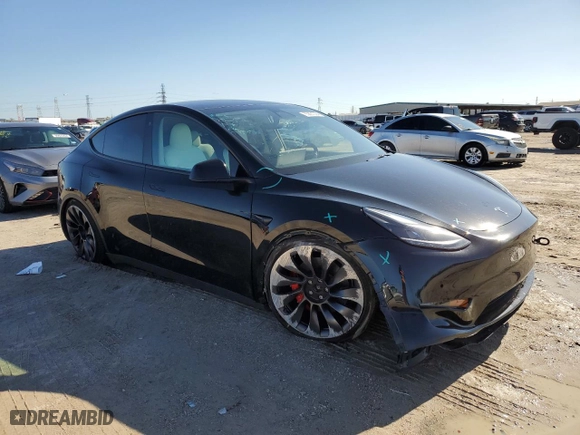 2022 Tesla Model Y Performance with VIN 7SAYGDEF5NF337004, listed as a Copart auction lot 85801004 with 24,945 mi miles and Salvage Title. Bid and sale history available at carsss.com. Image 4.