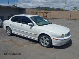 2002 Jaguar X-Type z VIN SAJEA51C02WC42090, wystawiony jako IAAI lot #42290488 z przebiegiem 189 757 mil mil oraz . Historia ofert i sprzedaży dostępna na DreamBid. Obrazek 1.