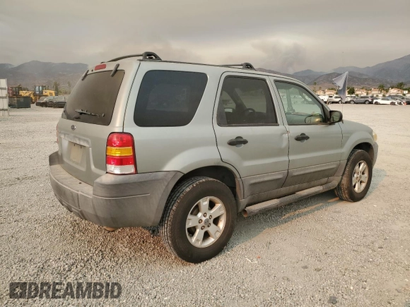 2005 Ford Escape XLT with VIN 1FMYU93Z35KC52175, listed as a Copart auction lot 71214694 with 125,278 mi miles and Salvage Title. Bid and sale history available at carsss.com. Image 3.