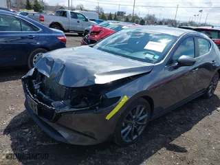 2021 Mazda Mazda3 Hatchback Select with VIN JM1BPBKLXM1337797, listed as a IAAI auction lot 42018058 with 46,763 mi miles. Bid and sale history available at carsss.com. Image 2.