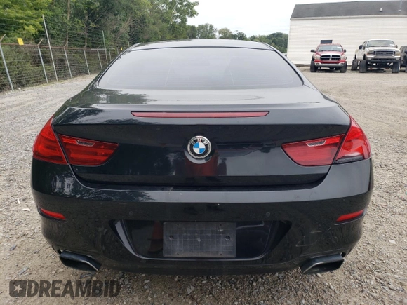 2013 BMW 6 Series 650i with VIN WBAYM9C52DDW20346, listed as a Copart auction lot 68133324 with 74,313 mi miles and Clean Title. Bid and sale history available at carsss.com. Image 6.