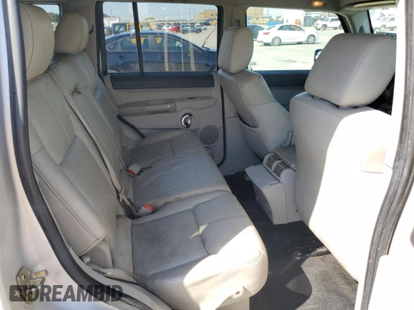 2006 Jeep Commander Limited z VIN 1J8HH58N46C125639, wystawiony jako Copart lot #74521154 z przebiegiem 276 411 mil mil oraz Szkoda całkowita • Salvage title. Historia ofert i sprzedaży dostępna na DreamBid. Obrazek 11.