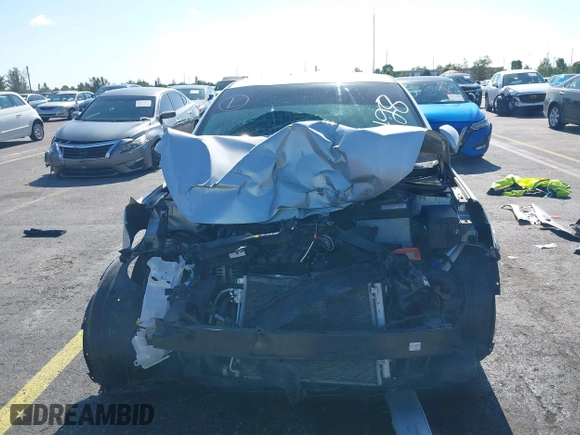 2018 Kia Rio LX with VIN 3KPA24AB0JE054428, listed as a IAAI auction lot 40101162 with 107,857 mi miles. Bid and sale history available at carsss.com. Image 6.